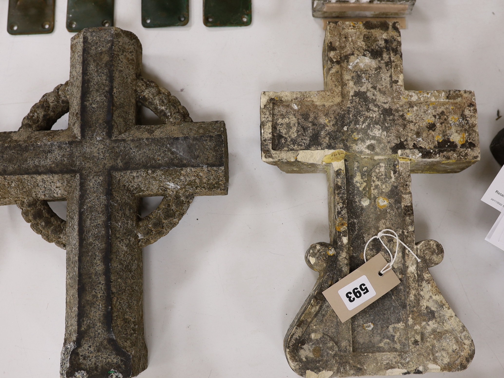 Four 19th century French stone crosses, largest 36cm tall